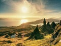 Morning view of Old Man of Storr rocks formation and lake Scotland