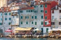 Morning view on old town Rovinj from harbor with outdoor restaurants, Croatia Royalty Free Stock Photo