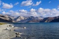 Morning view of Pangong lake with himalyan mountain range in background in Leh