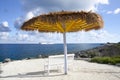 Little Stirrup Cay Bench With Straw Umbrella Royalty Free Stock Photo