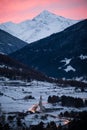 Morning view of snow covered mountains and village close to Bormio, Italy