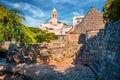 Morning view of strret with trullo trulli - traditional Apulian dry stone hut with a conical roof. Spring cityscape of Alberobe