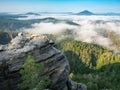 Morning view to misty Swiss Bohemian landscape during sunrise. Morning mist Royalty Free Stock Photo