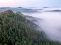 Morning view to misty Swiss Bohemian landscape during sunrise. Morning mist Royalty Free Stock Photo