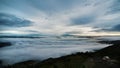 Morning vista view of Lake Elsinore basin filled with fog and low clouds.