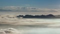 Morning vista view of Lake Elsinore basin filled with fog and low clouds.