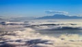 Morning vista view of Lake Elsinore basin filled with fog and low clouds.