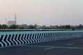 Morning Walk Sport Man and Woman Cycling through the bridge on the highway road