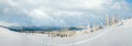 Morning winter calm mountain panorama with sheds group and mount ridge behind (Carpathian Mountains, Ukraine Royalty Free Stock Photo