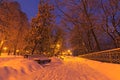 Morning in winter Mariinsky Park. Straight alley in the park with empty benches in the snow and lanterns Royalty Free Stock Photo