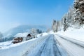 Morning winter misty rural alpine road and house Royalty Free Stock Photo