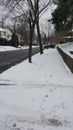 Morning Winter stroll in snowy neighborhood