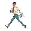 Morning work routine of an office worker. African American businessman goes to work. A man in a suit walks with a folder