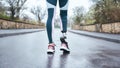 Morning workout. Cropped photo of of disabled athlete woman in sportwear with prosthetic leg standing outdoor