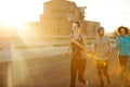 Mornings are the quietest time to run. three friends out jogging in the city in the early morning. Royalty Free Stock Photo