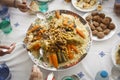 Moroccan or arabic family meeting top view with Couscous traditional moroccan and kofta meatballs