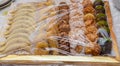 Moroccan biscuits and pastries dipped in honey for sale in the Medina of Fes in Morocco