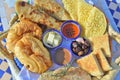 Moroccan breakfast with Baghrir. Bread with barley. Croissants with honey and butter. Moroccan pancakes