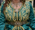 Moroccan bride wearing a green traditional dress