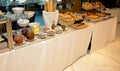 Moroccan buffet, traditional Moroccan food, tagine, chebakia, and Arabic sweets