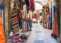 Moroccan carpets and clothing for sale on the narrow streets of Essaouira, Morocco Royalty Free Stock Photo