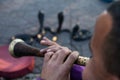 Moroccan Cobra enchanter sitting in the street with his cobra. Marrakesh, Jamma el fnaa