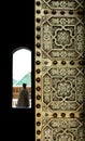 Moroccan copper door and a gatekeeper Royalty Free Stock Photo