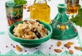 Moroccan couscous with dried fruit and nuts in tagÃÂ­ne