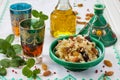 Moroccan couscous with dried fruit and nuts in tagÃÂ­ne