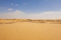 Moroccan desert landscape with blue sky. view of desert dunes at sunset. Royalty Free Stock Photo