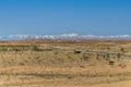 Moroccan desert road in Ouarzazate province. Road curve. Royalty Free Stock Photo