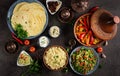 Moroccan food. Traditional tajine dishes, couscous and fresh salad