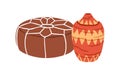 Moroccan furniture and home decor. Traditional Berber pouf, round footrest and vase. Morocco interior decoration, Maroc