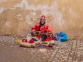 Moroccan Gnawa street musician playing gumbri