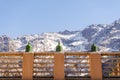 Moroccan green lantern on the top of the fence with Toubkal mountain range in Morocco