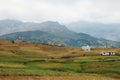 Moroccan landscape with mountains and green field Royalty Free Stock Photo