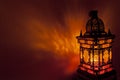 Moroccan lantern with gold colored glass in horiz