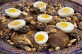 Moroccan meat, plums and eggs