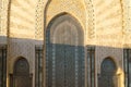 Moroccan mosaic and patterns , view of Hassan II Mosque big gate, Detail of Hassan II Mosque at sunset in Casablanca, Morocco