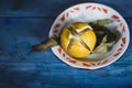 Moroccan preserved salted lemon on blue table