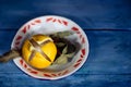 Moroccan preserved salted lemon on blue table