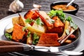 Moroccan roasted parsnip and carrot on a plate