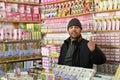 Moroccan shop owner selling body care products