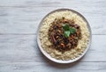 Moroccan spiced mince with couscous on a table.