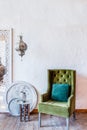 Moroccan style interior with green chair