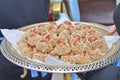 Moroccan sweets. Giving sweets to guests at the wedding.