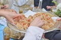 Moroccan sweets. Giving sweets to guests at the wedding.