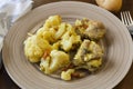 Moroccan tagine cauliflower with beef meat served on a plate