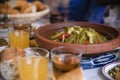 Moroccan Tajine of meat that is the typical dish of Morocco and is usually accompanied with olives and drinks like juice and tea