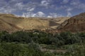 Moroccan village with mountains, river, desert, mountains and lush vegetation Royalty Free Stock Photo